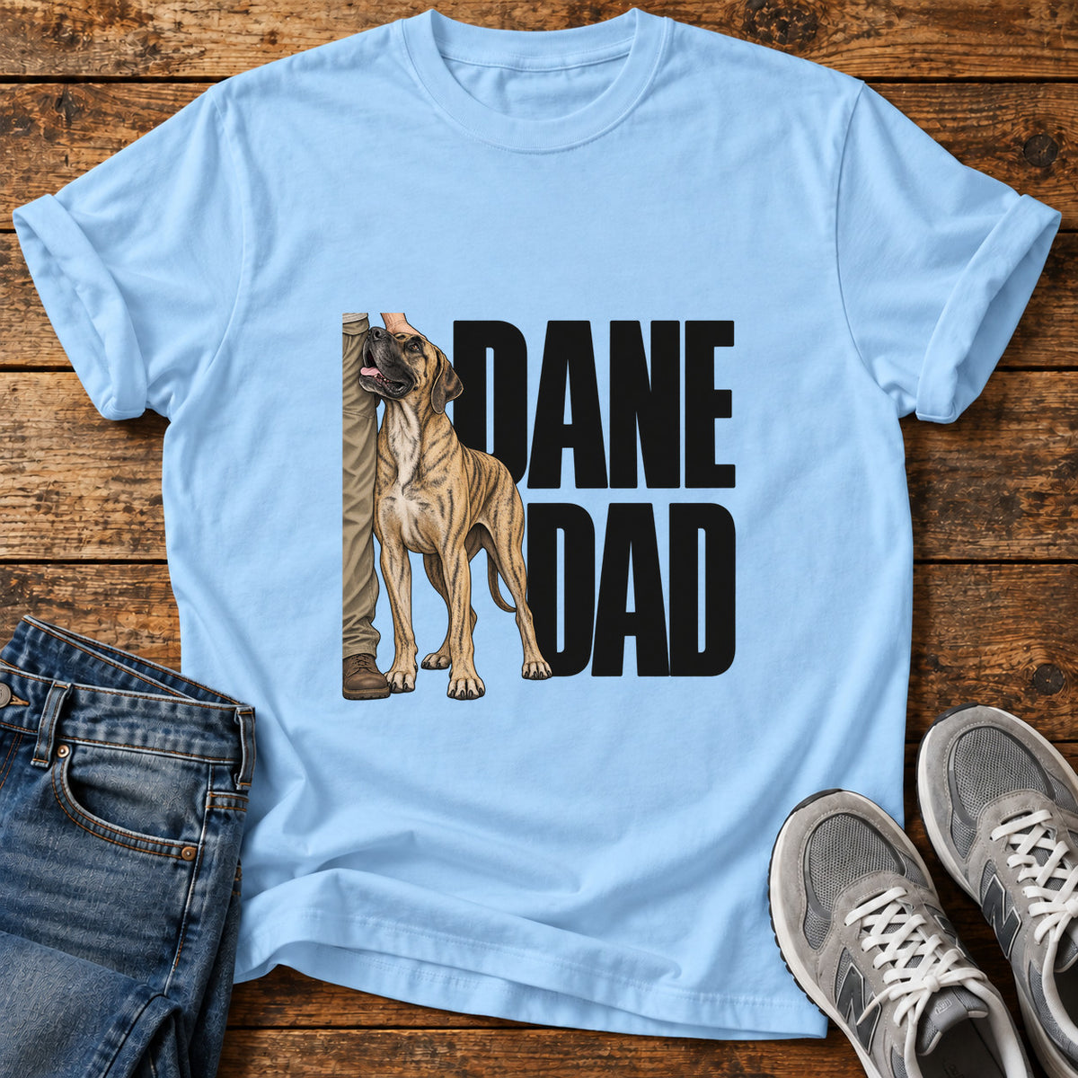 Dane Dad Great Dane graphic T-shirt in Light Blue, shown on a flat-lay shirt mockup