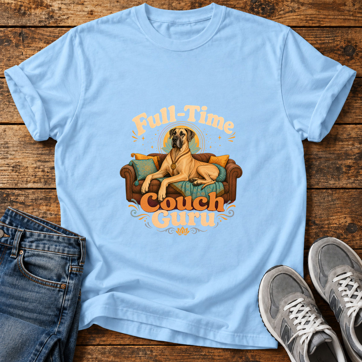 Couch Guru Great Dane graphic T-shirt in Light Blue, shown on a flat-lay shirt mockup