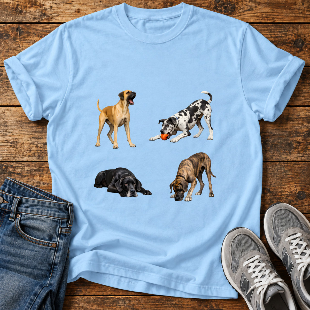 Great Dane Quartet graphic T-shirt in Light Blue, shown on a flat-lay shirt mockup