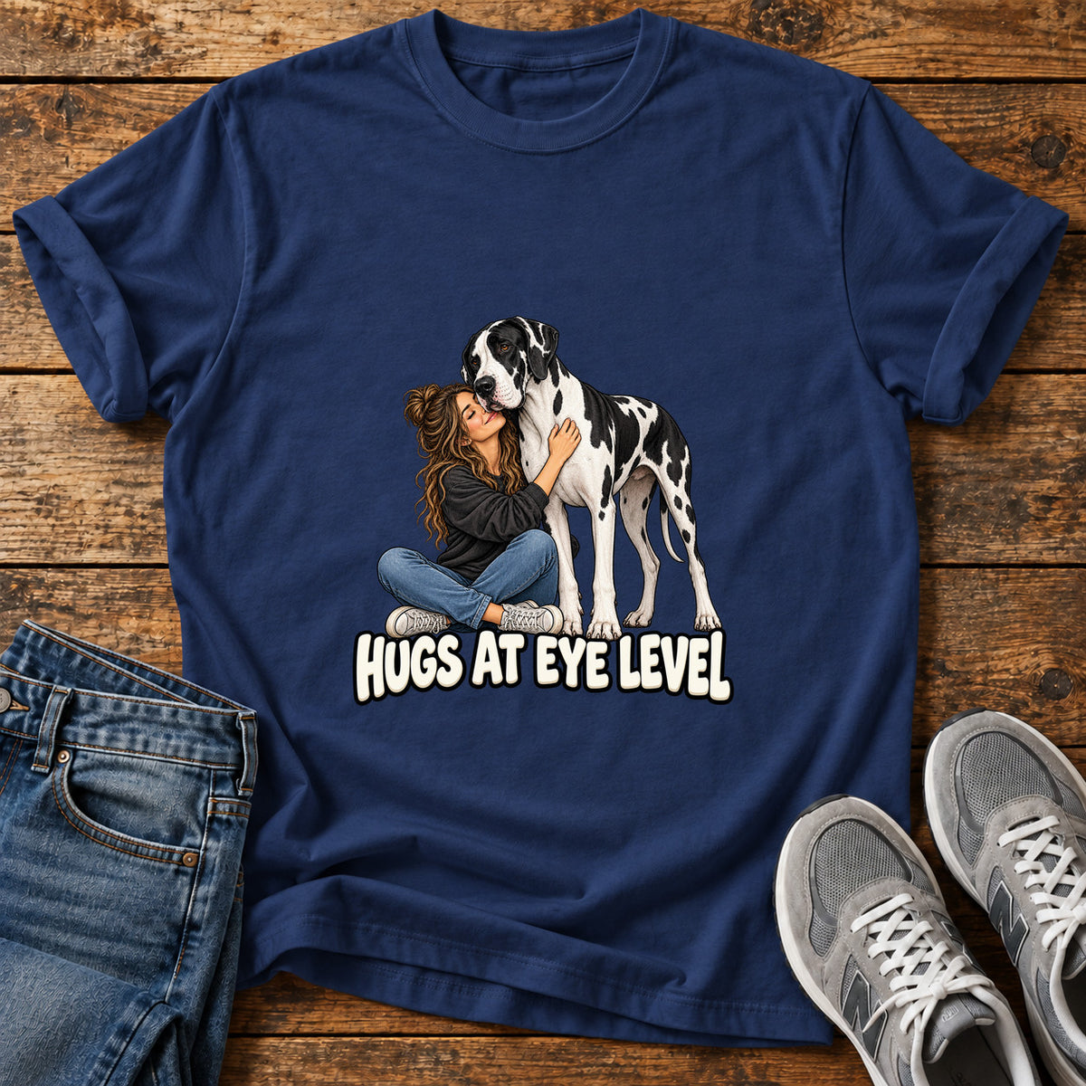 Hugs At Eye Great Dane graphic T-shirt in Navy, shown on a flat-lay shirt mockup