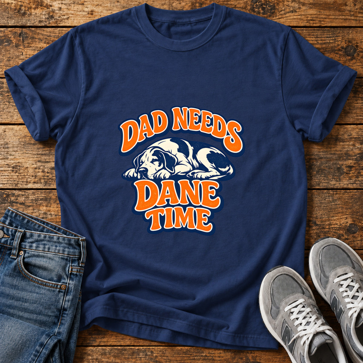 Dad Needs Dane Great Dane graphic T-shirt in Navy, shown on a flat-lay shirt mockup
