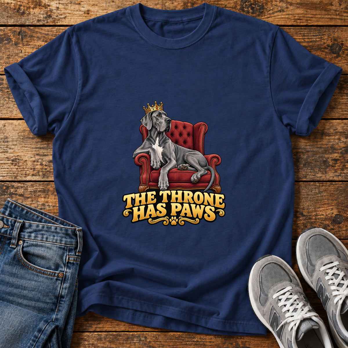 Throne Paws Majesty Great Dane graphic T-shirt in Navy, shown on a flat-lay shirt mockup