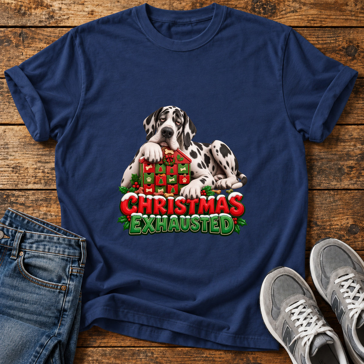 Christmas Exhausted Great Dane graphic T-shirt in Navy, shown on a flat-lay shirt mockup