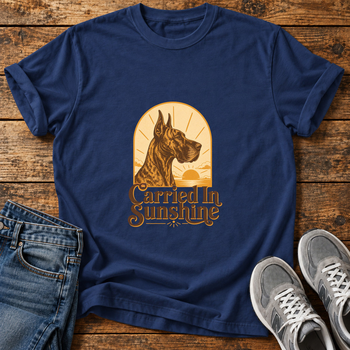 Carried In Sunshine Great Dane graphic T-shirt in Navy, shown on a flat-lay shirt mockup