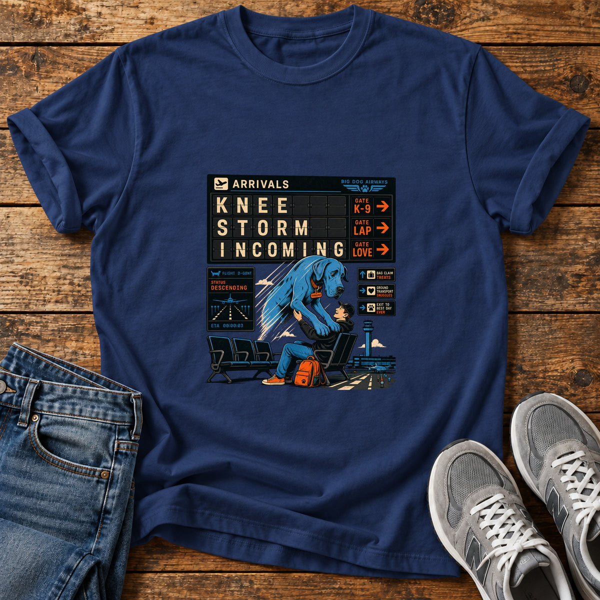 Knee Storm Incoming Great Dane graphic T-shirt in Navy, shown on a flat-lay shirt mockup