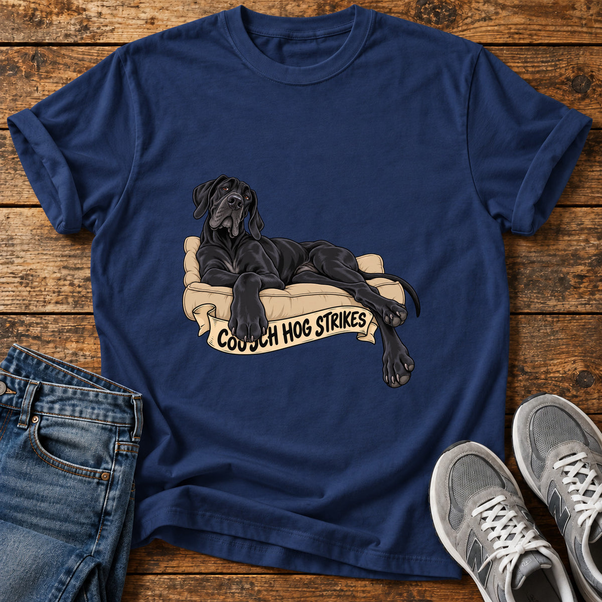 Couch Hog Strikes Great Dane graphic T-shirt in Navy, shown on a flat-lay shirt mockup
