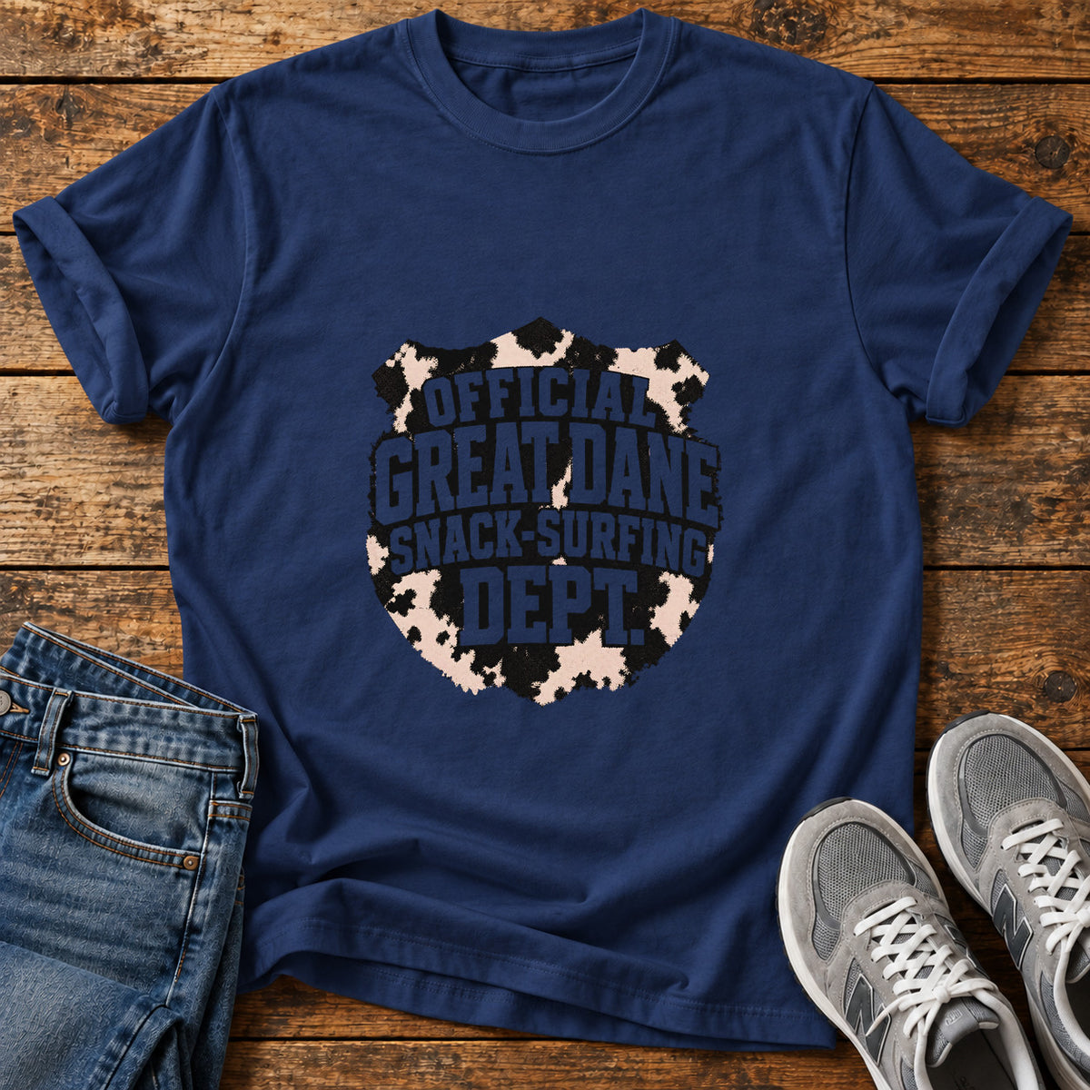 Snack-Surfing Dept Great Dane graphic T-shirt in Navy, shown on a flat-lay shirt mockup