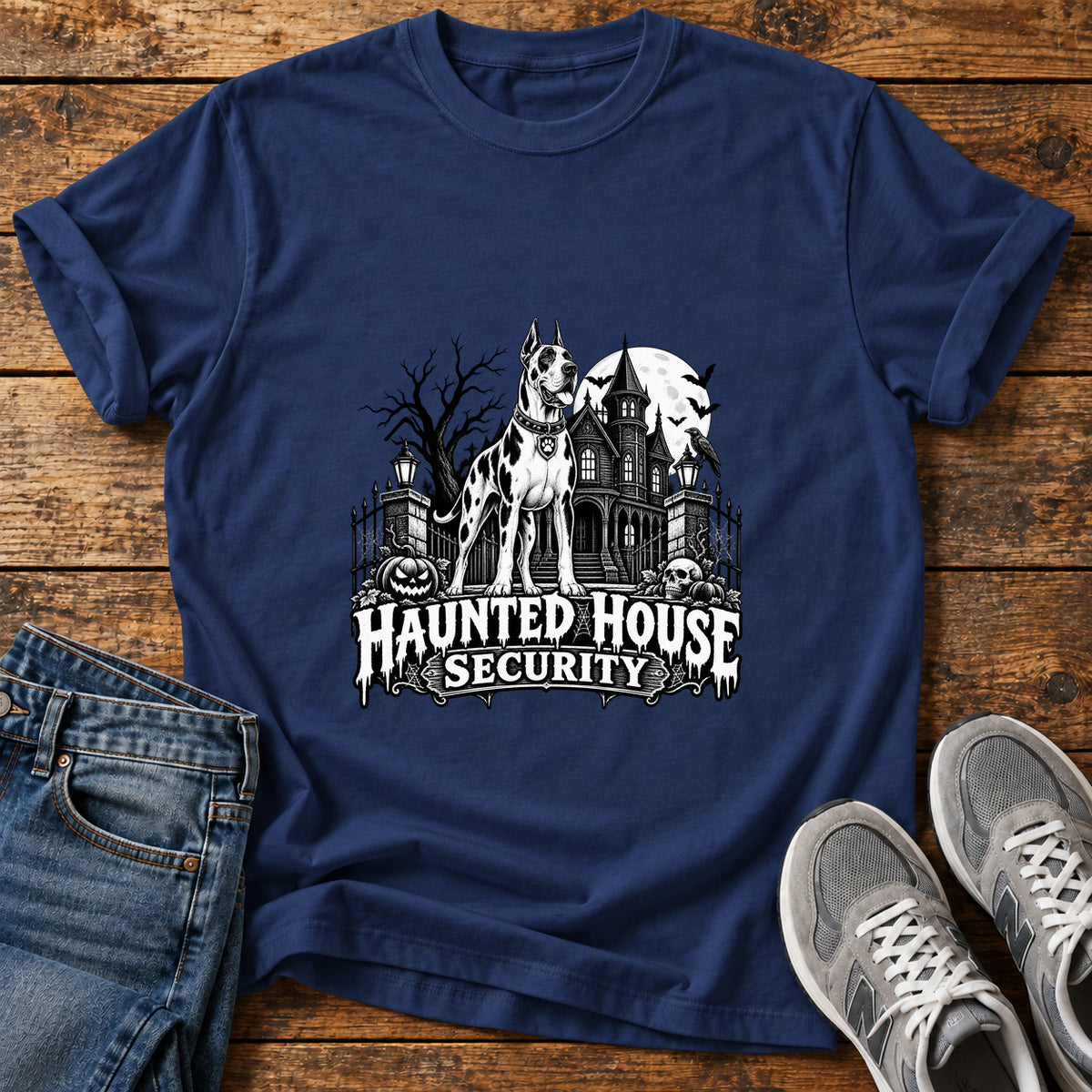 Haunted House Security Great Dane graphic T-shirt in Navy, shown on a flat-lay shirt mockup