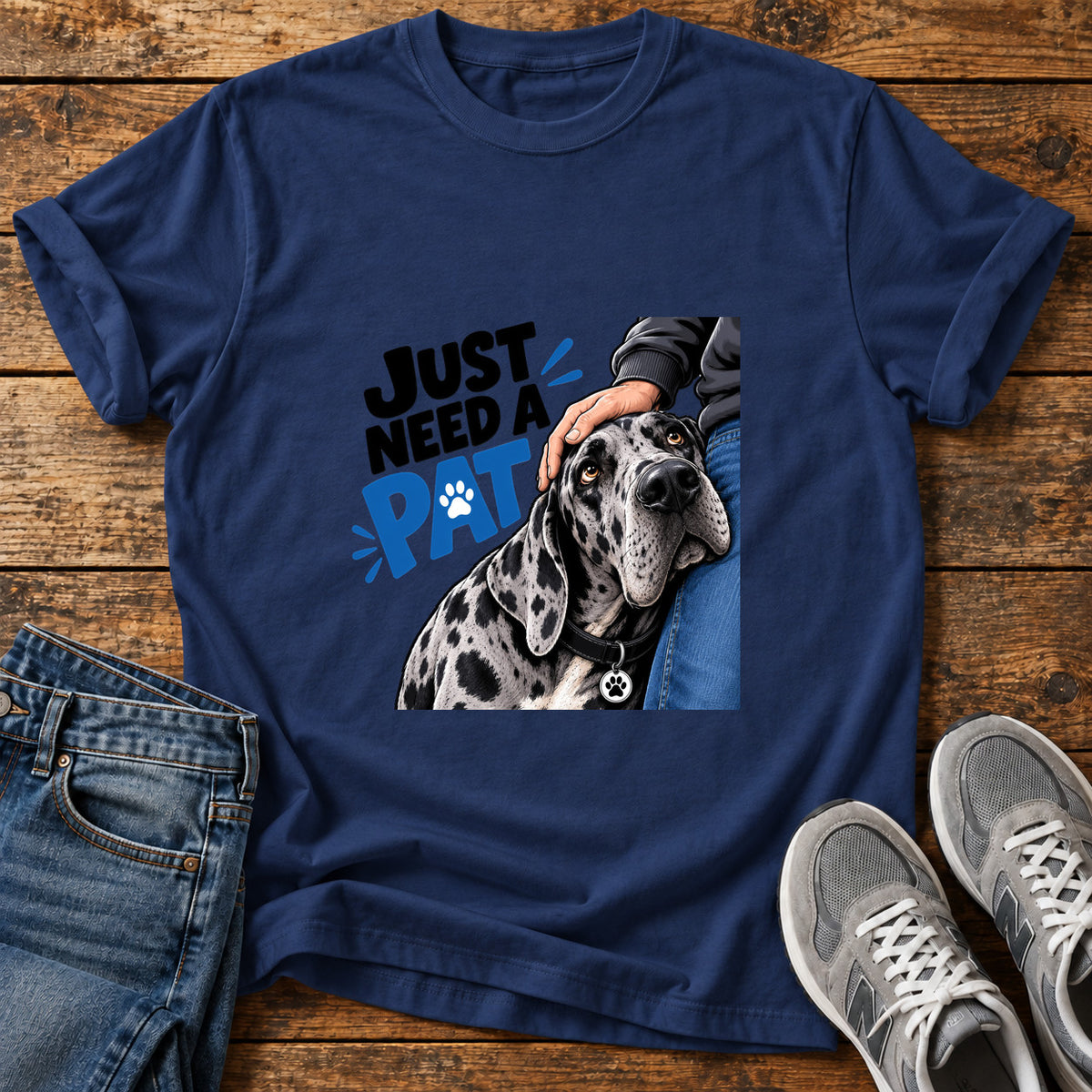 Just Need Pat Great Dane graphic T-shirt in Navy, shown on a flat-lay shirt mockup