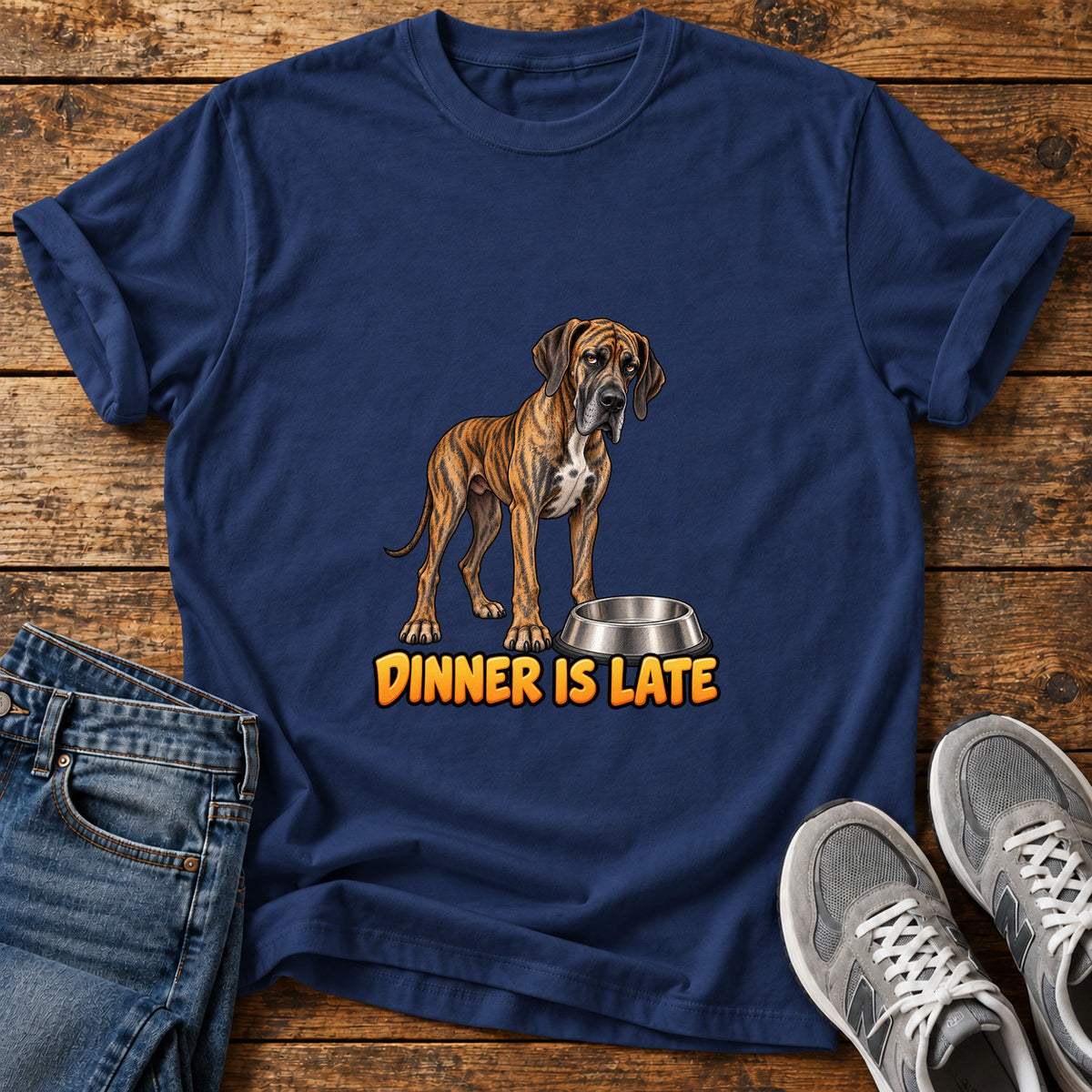 Dinner Is Late Great Dane graphic T-shirt in Navy, shown on a flat-lay shirt mockup