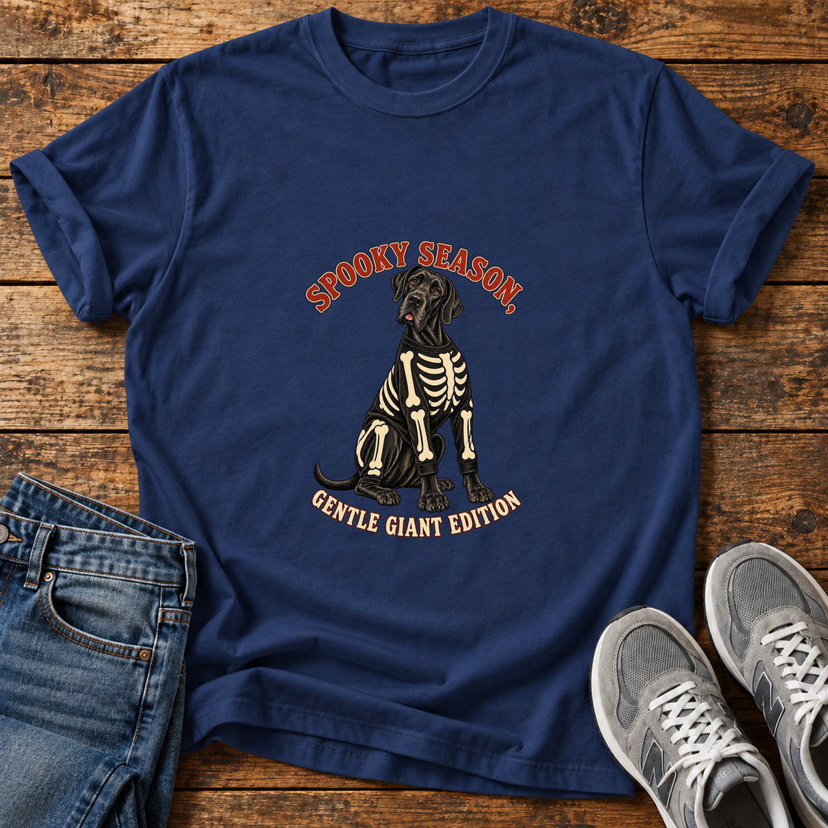 Spooky Gentle Giant Great Dane graphic T-shirt in Navy, shown on a flat-lay shirt mockup
