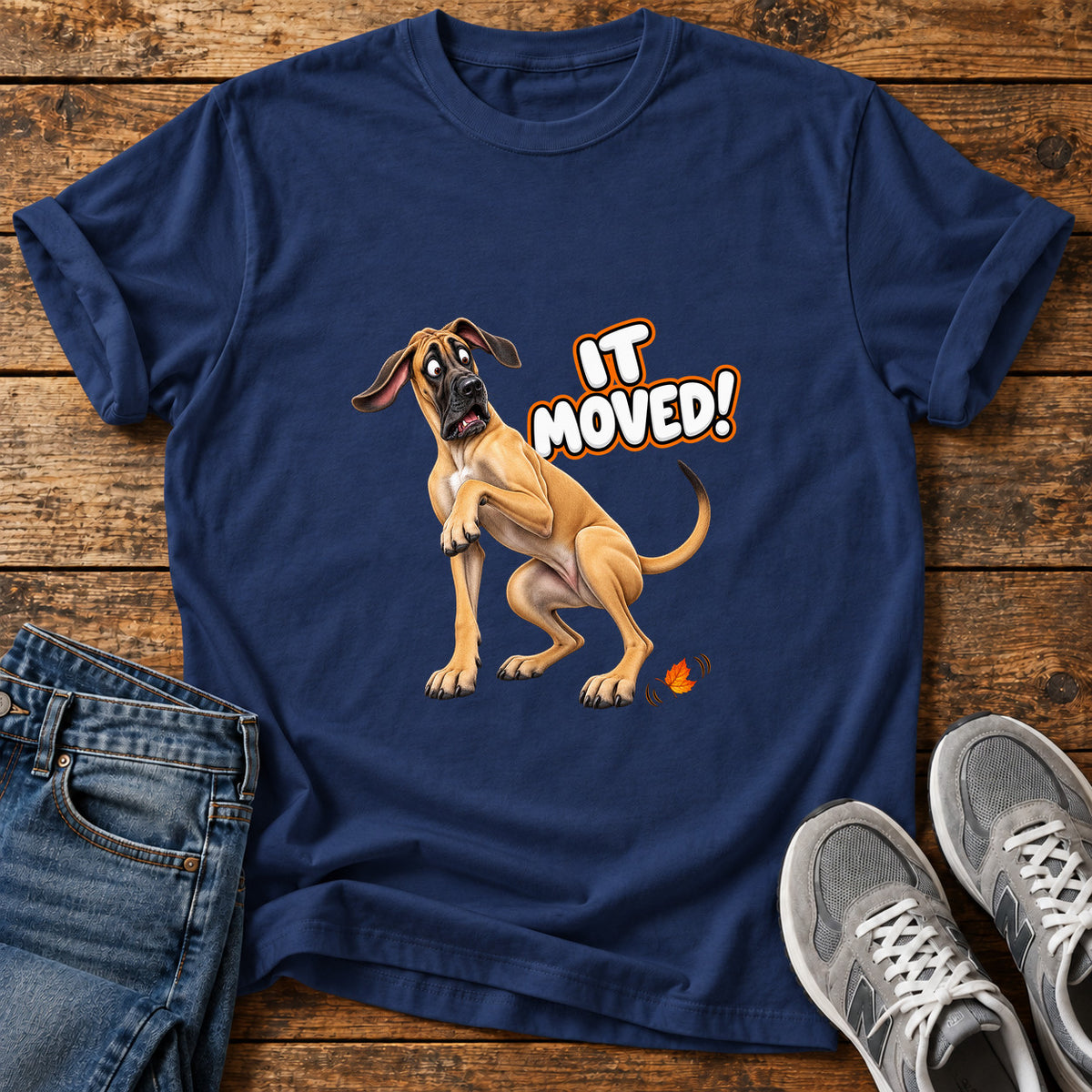 It Moved Great Dane graphic T-shirt in Navy, shown on a flat-lay shirt mockup