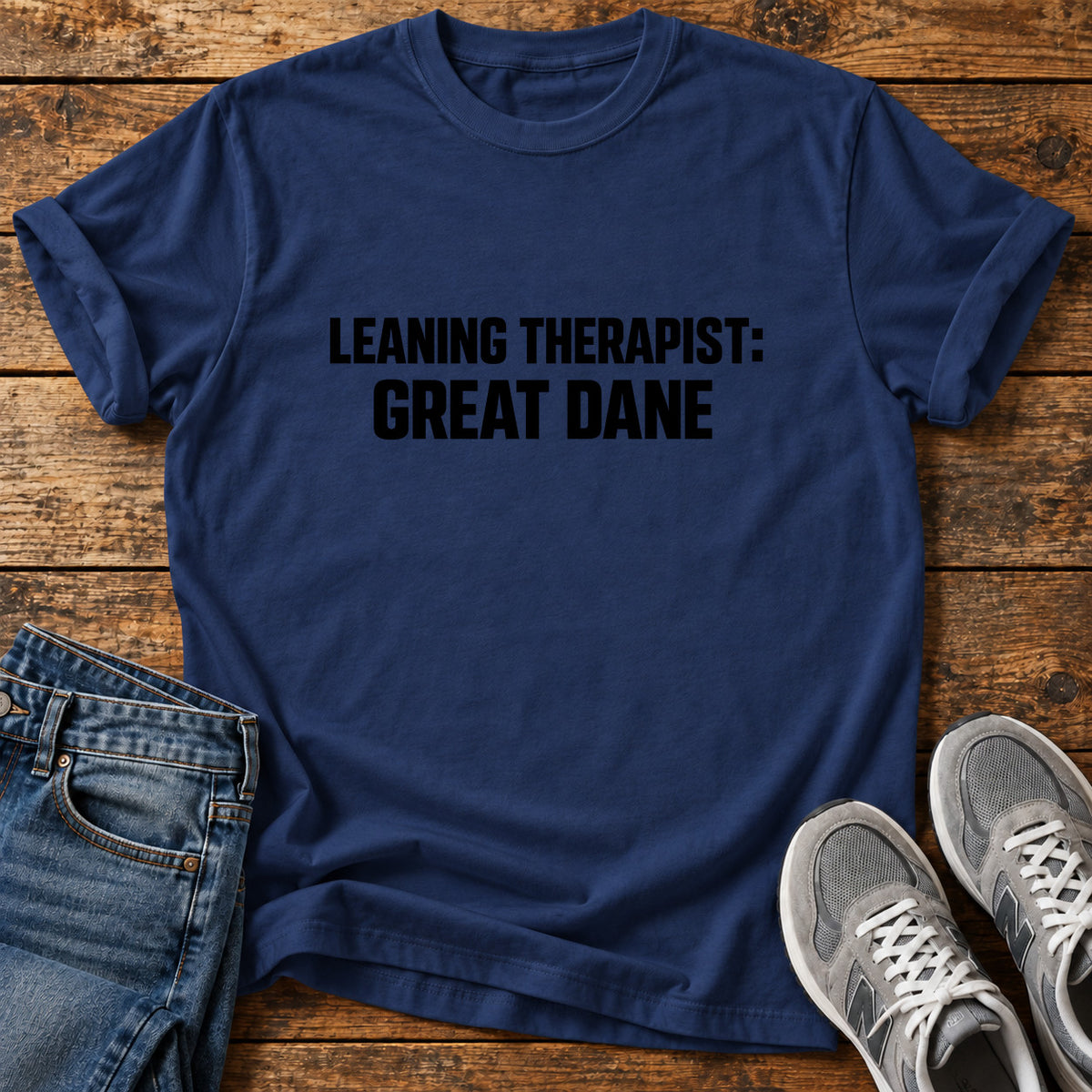 Leaning Therapist Great Dane graphic T-shirt in Navy, shown on a flat-lay shirt mockup