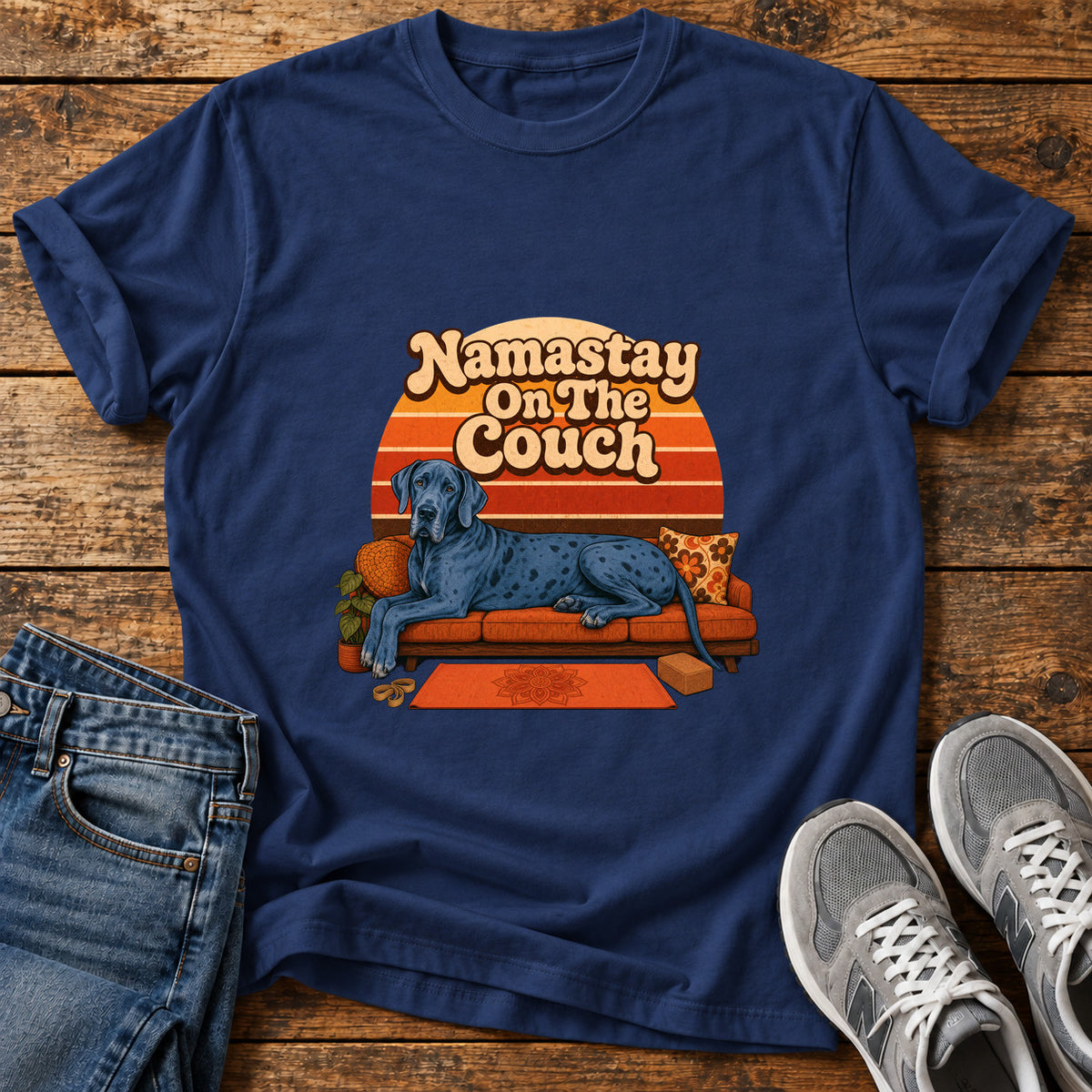 Namastay Couch Pooch Great Dane graphic T-shirt in Navy, shown on a flat-lay shirt mockup