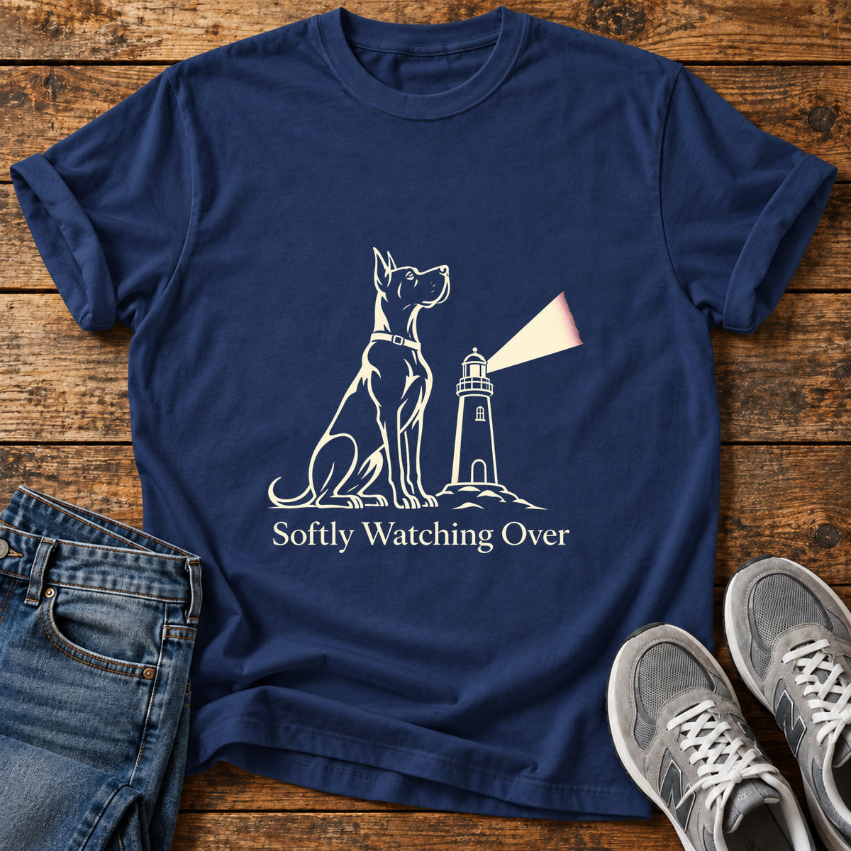 Softly Watching Over Great Dane graphic T-shirt in Navy, shown on a flat-lay shirt mockup