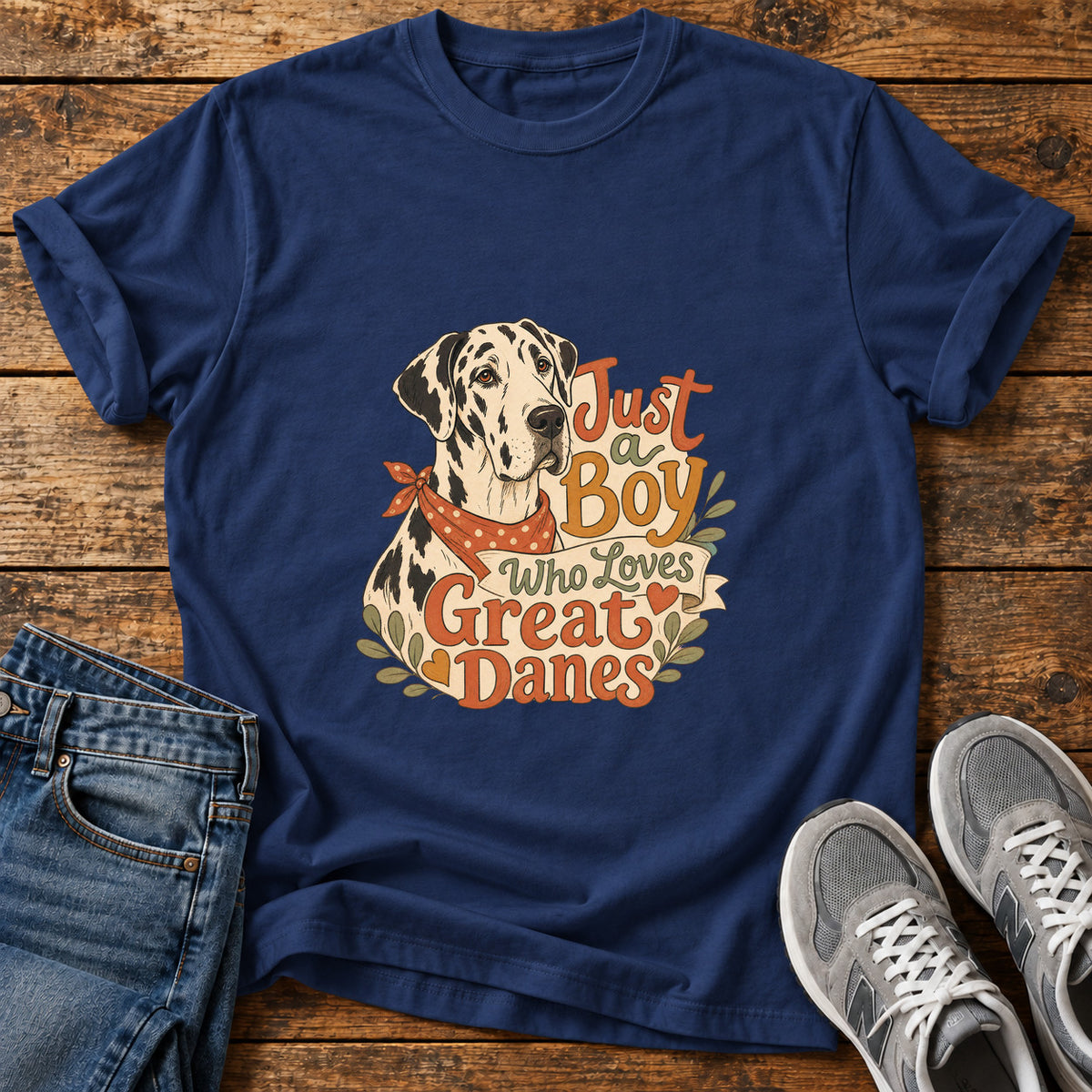 Just a Boy Great Dane graphic T-shirt in Navy, shown on a flat-lay shirt mockup