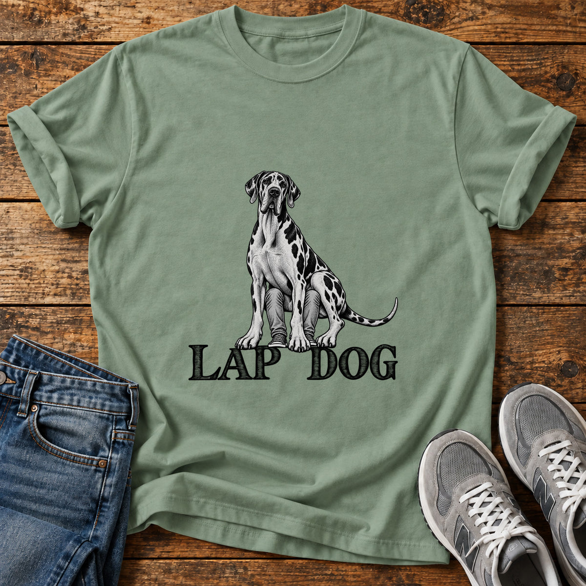 Lap Dog Great Dane graphic T-shirt in Sage, shown on a flat-lay shirt mockup
