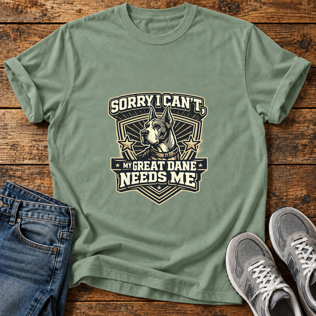 Sorry Great Dane graphic T-shirt in Sage, shown on a flat-lay shirt mockup