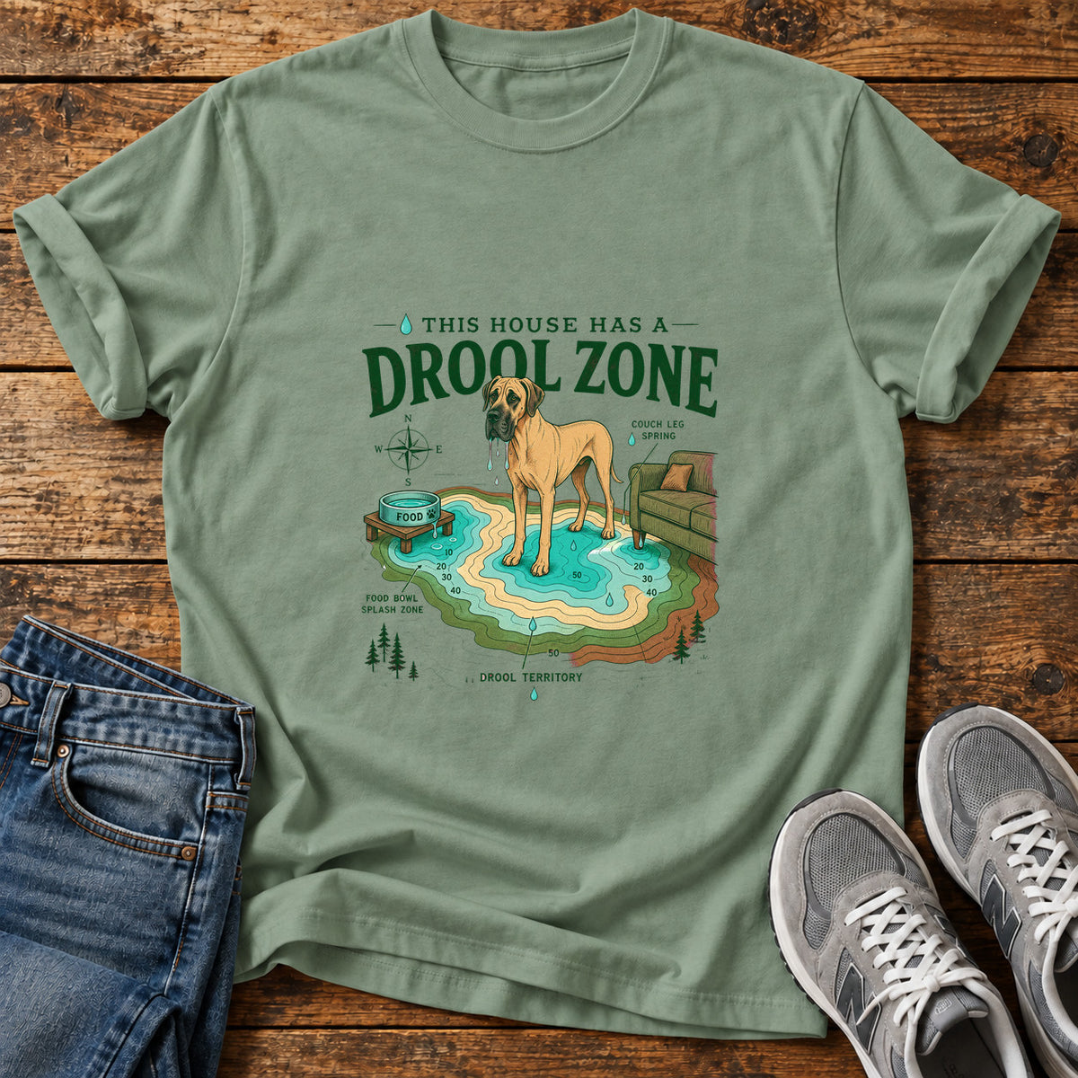 Drool Zone Zone Great Dane graphic T-shirt in Sage, shown on a flat-lay shirt mockup
