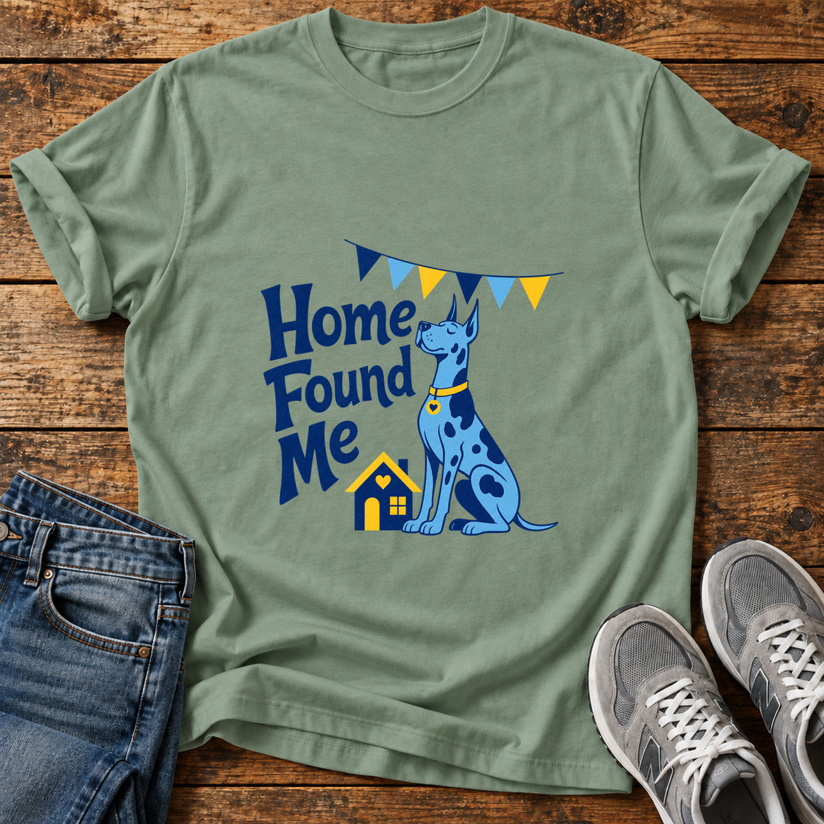 Home Found Me Great Dane graphic T-shirt in Sage, shown on a flat-lay shirt mockup