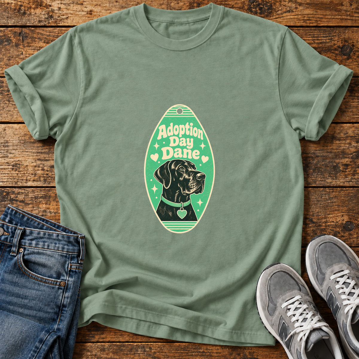 Adoption Day Dane Great Dane graphic T-shirt in Sage, shown on a flat-lay shirt mockup