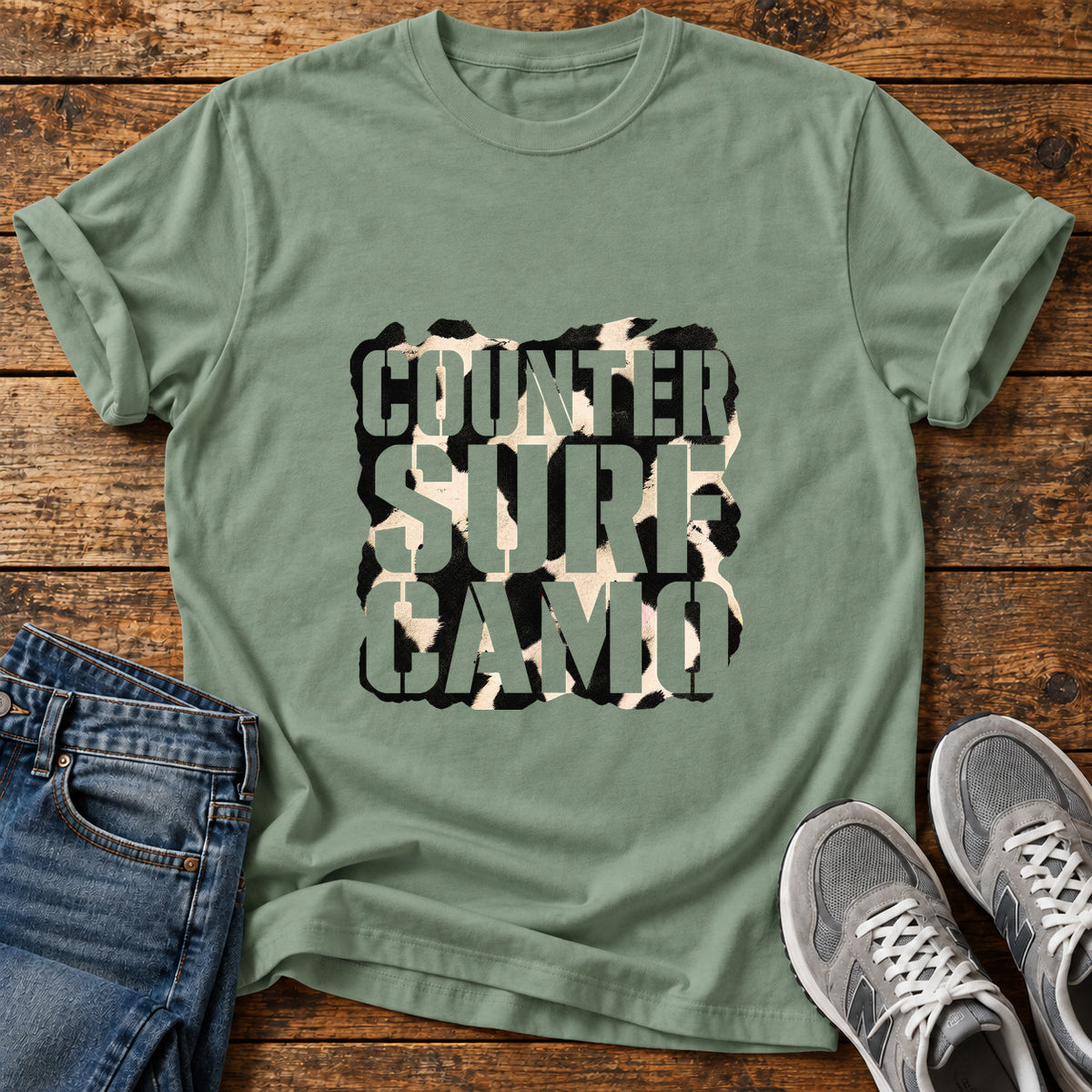 Counter Surf Camo Great Dane graphic T-shirt in Sage, shown on a flat-lay shirt mockup
