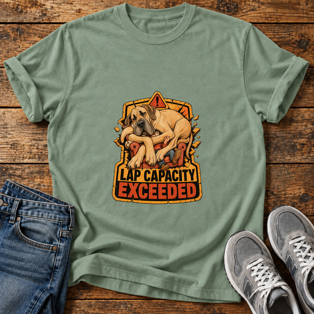Lap Capacity Exceeded Great Dane graphic T-shirt in Sage, shown on a flat-lay shirt mockup