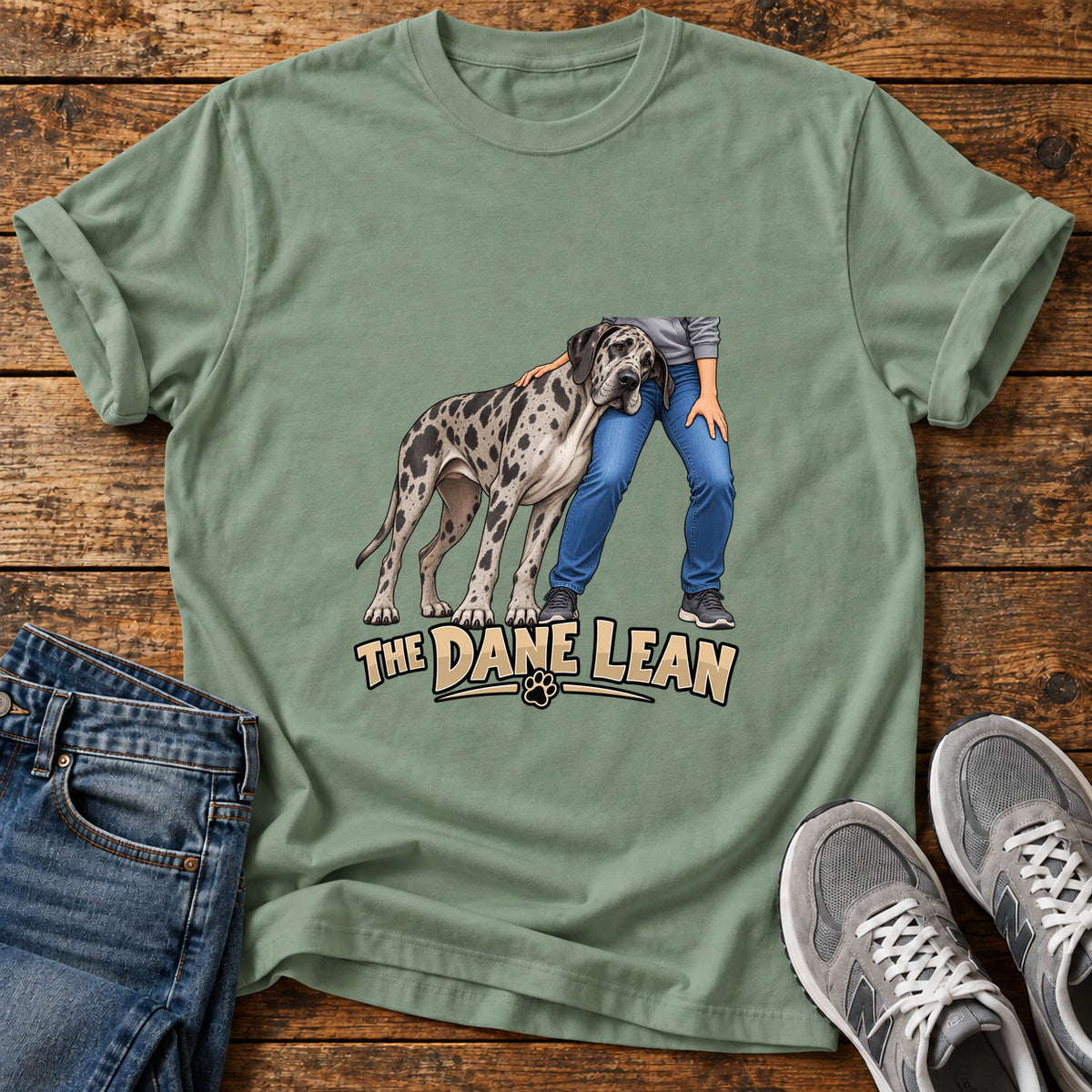 The Dane Lean Great Dane graphic T-shirt in Sage, shown on a flat-lay shirt mockup