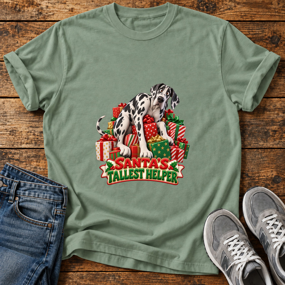 Santa's Tallest Helper Great Dane graphic T-shirt in Sage, shown on a flat-lay shirt mockup