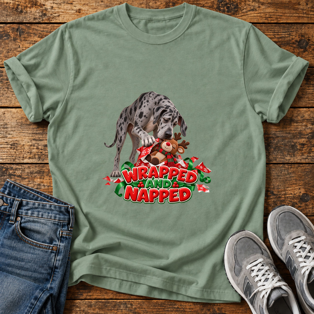 Wrapped Napped Great Dane graphic T-shirt in Sage, shown on a flat-lay shirt mockup