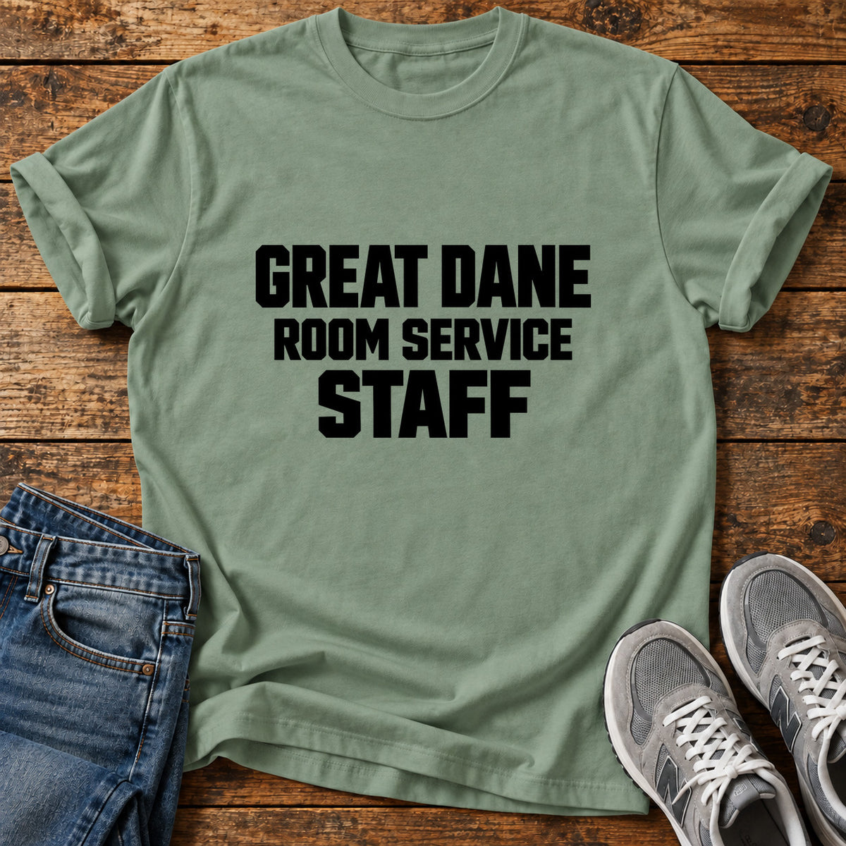 Great Dane Service graphic T-shirt in Sage, shown on a flat-lay shirt mockup