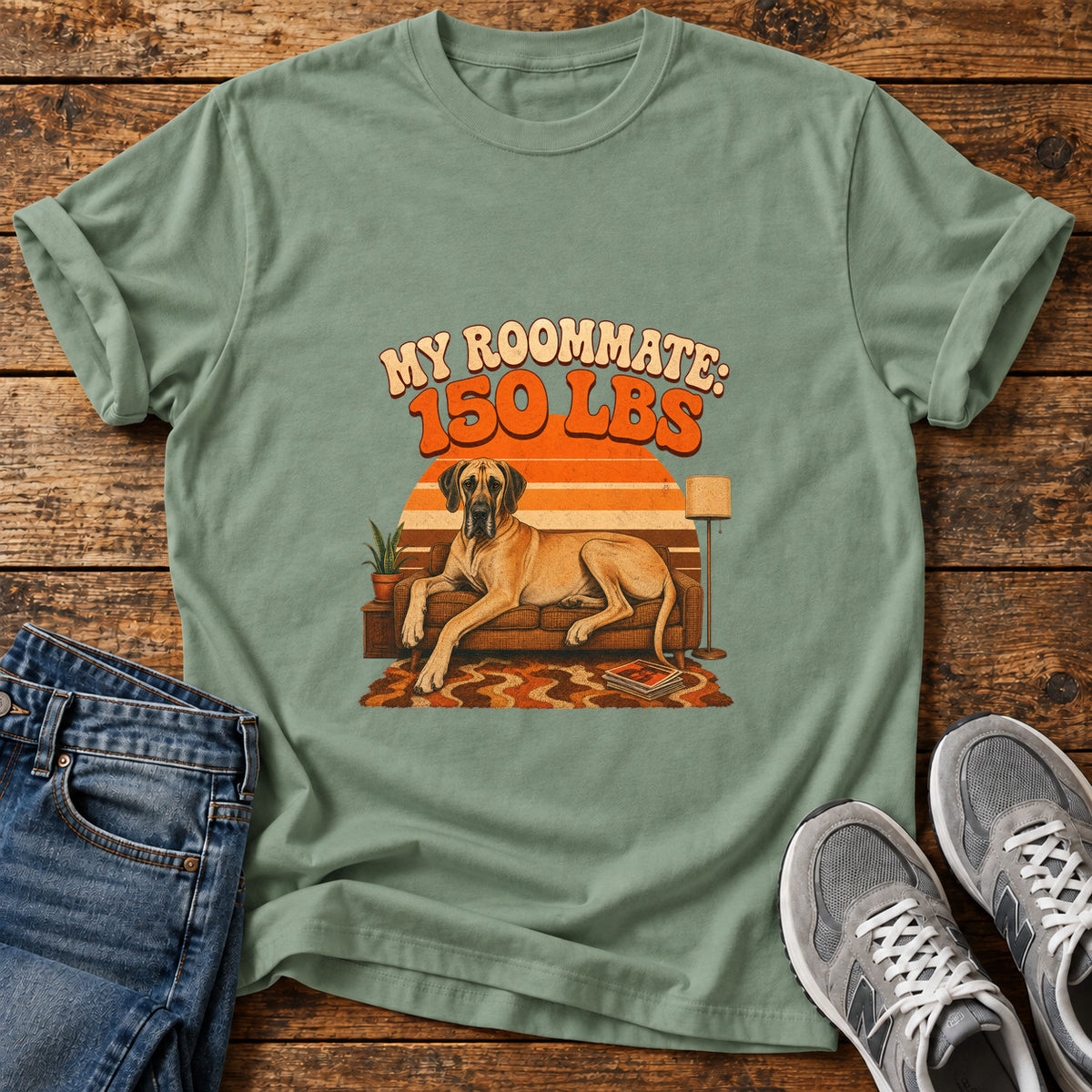 Roommate 150lbs Great Dane graphic T-shirt in Sage, shown on a flat-lay shirt mockup