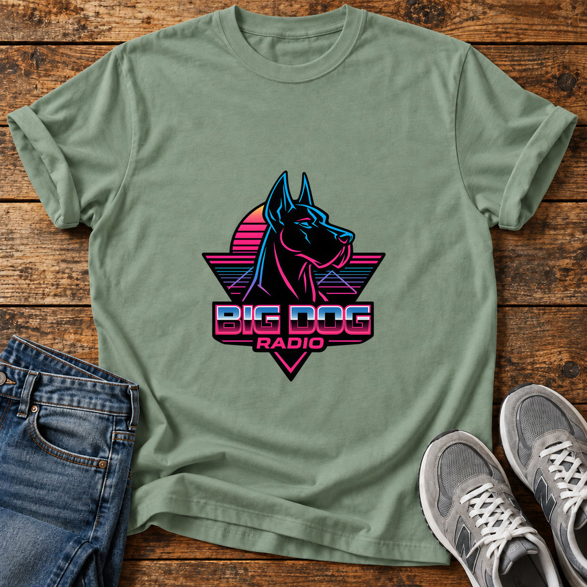 Big Dog Radio Great Dane graphic T-shirt in Sage, shown on a flat-lay shirt mockup