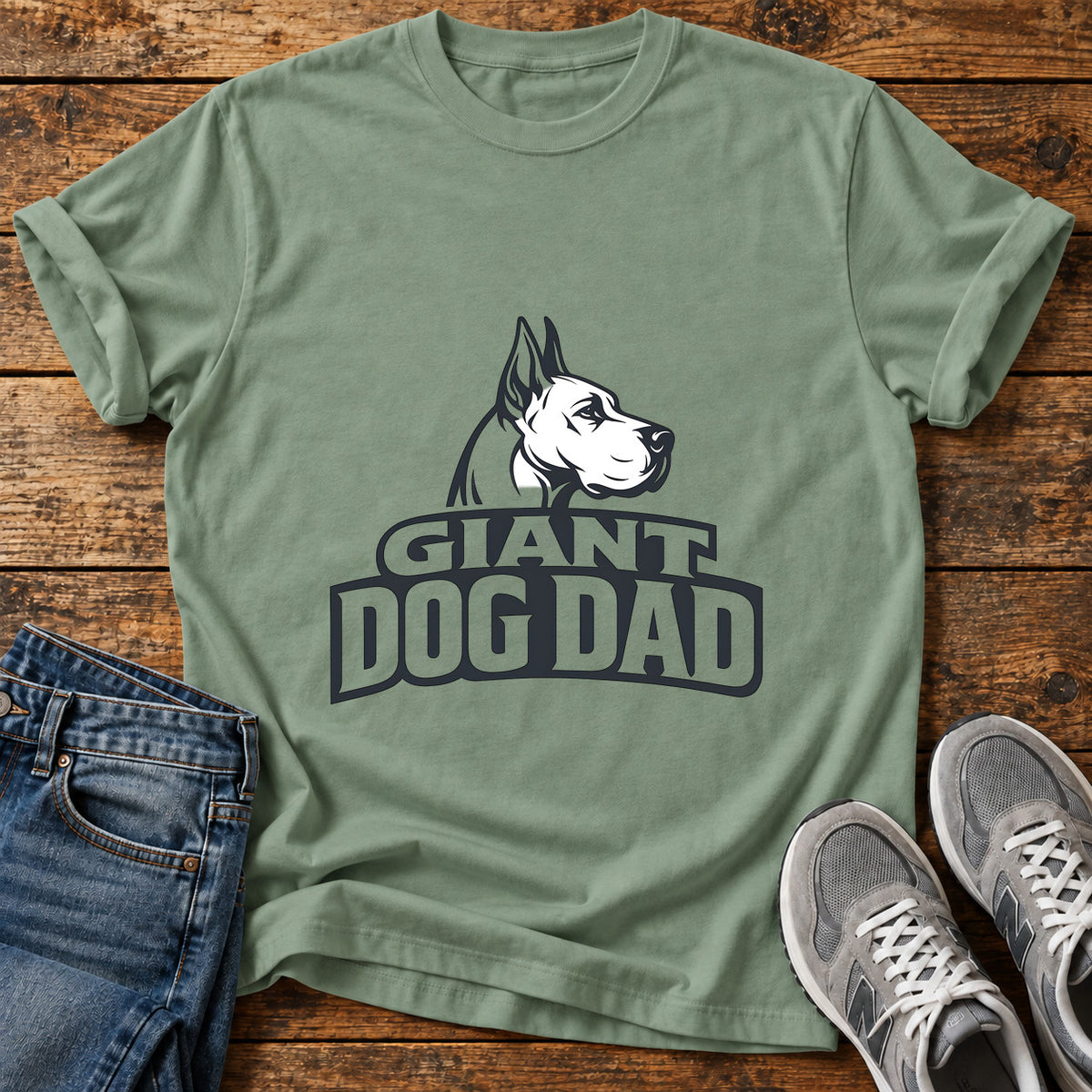 Giant Dog Dad Great Dane graphic T-shirt in Sage, shown on a flat-lay shirt mockup