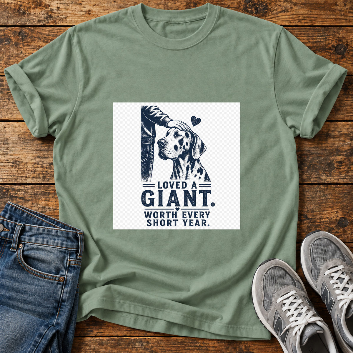 Loved A Giant Great Dane graphic T-shirt in Sage, shown on a flat-lay shirt mockup
