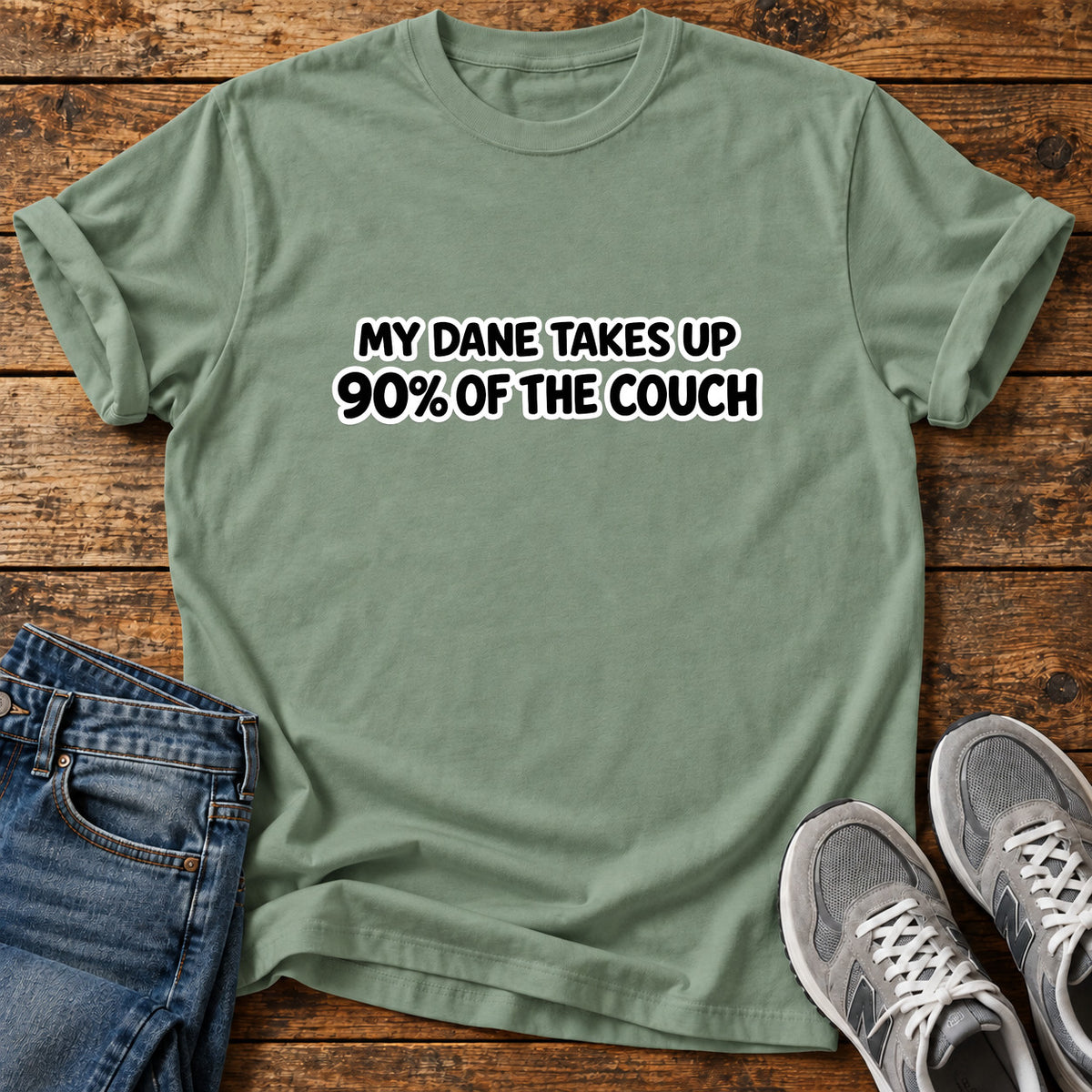 Dane Couch Hog Great Dane graphic T-shirt in Sage, shown on a flat-lay shirt mockup