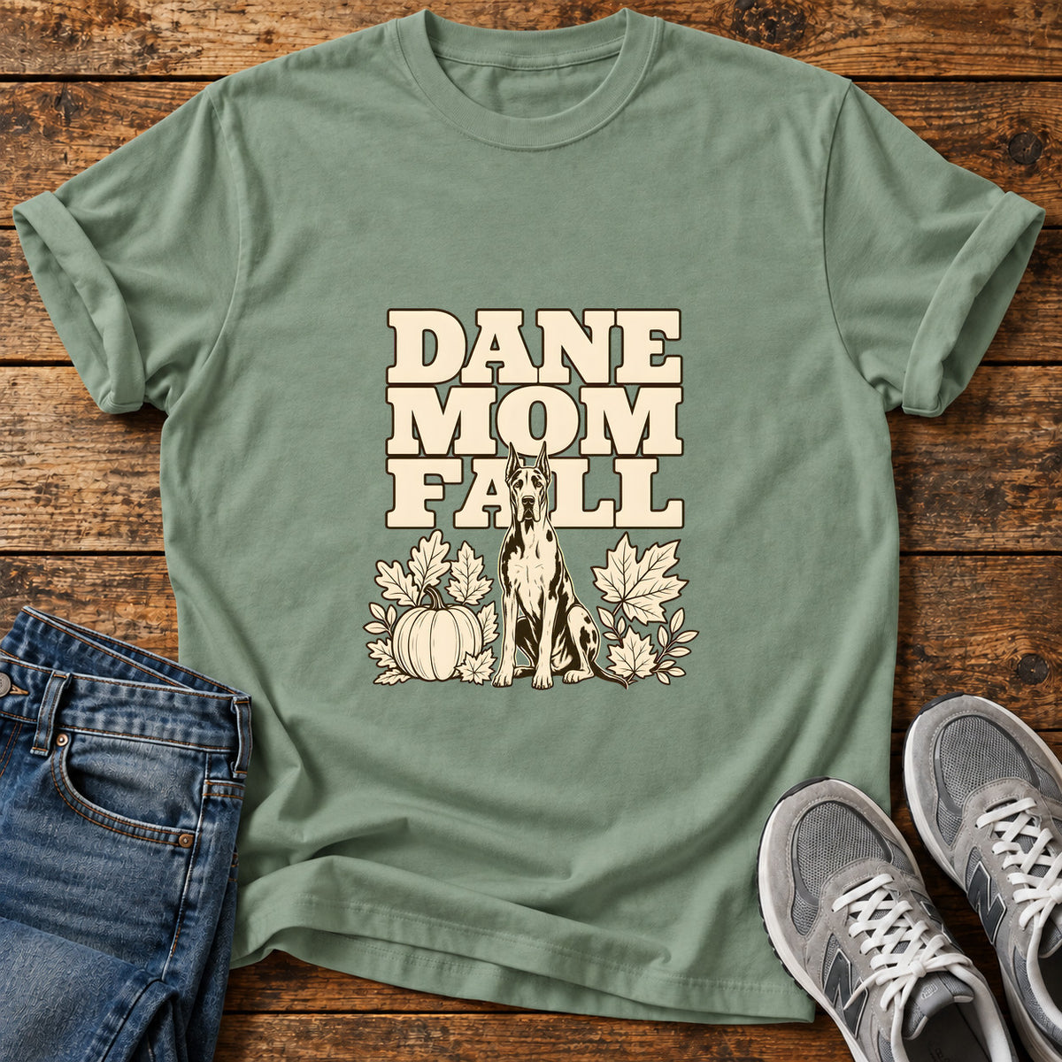 Dane Mom Fall Great Dane graphic T-shirt in Sage, shown on a flat-lay shirt mockup