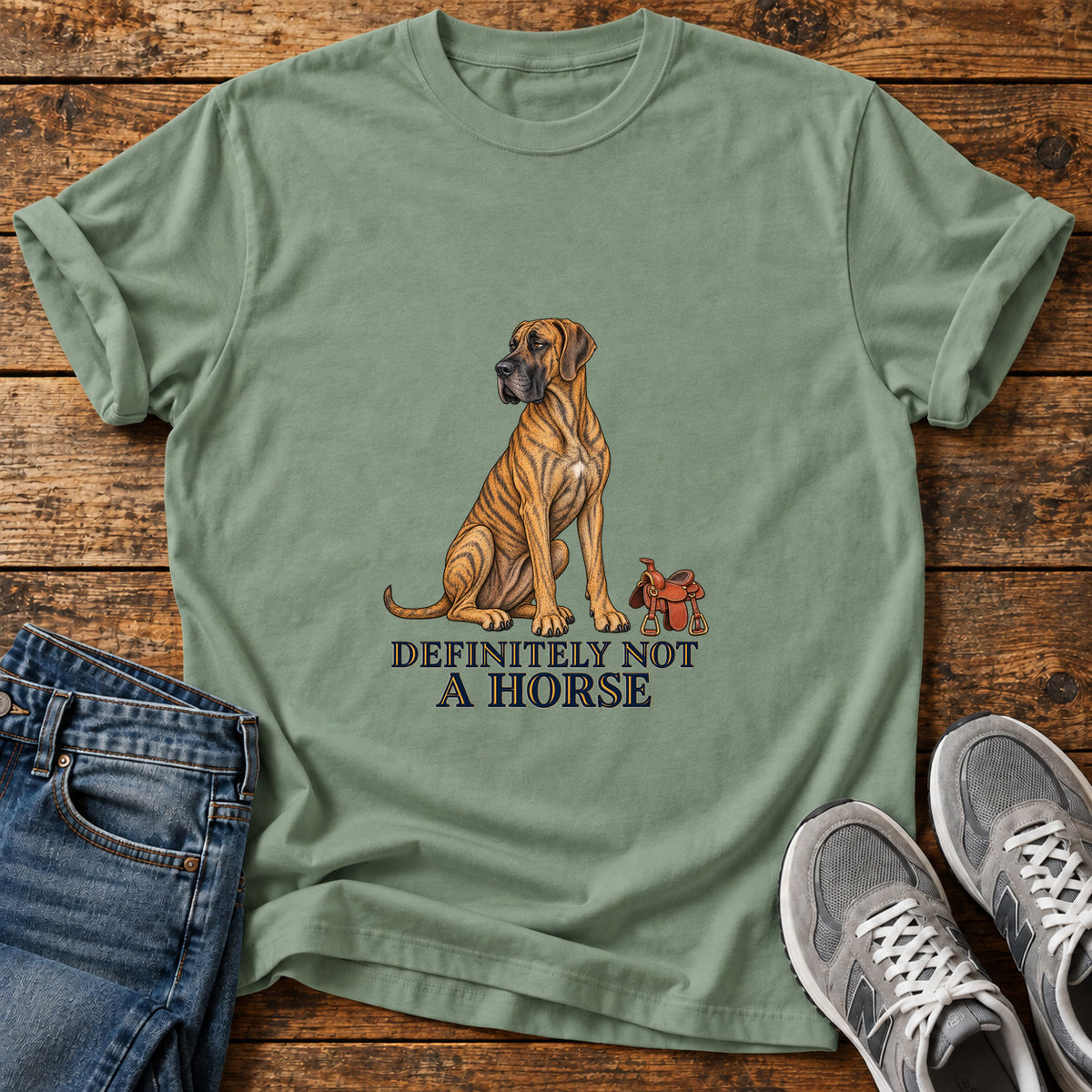 Definitely Not Horse Great Dane graphic T-shirt in Sage, shown on a flat-lay shirt mockup