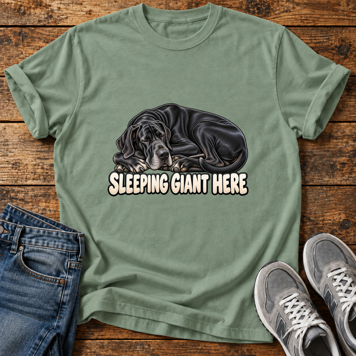 Sleeping Giant Great Dane graphic T-shirt in Sage, shown on a flat-lay shirt mockup