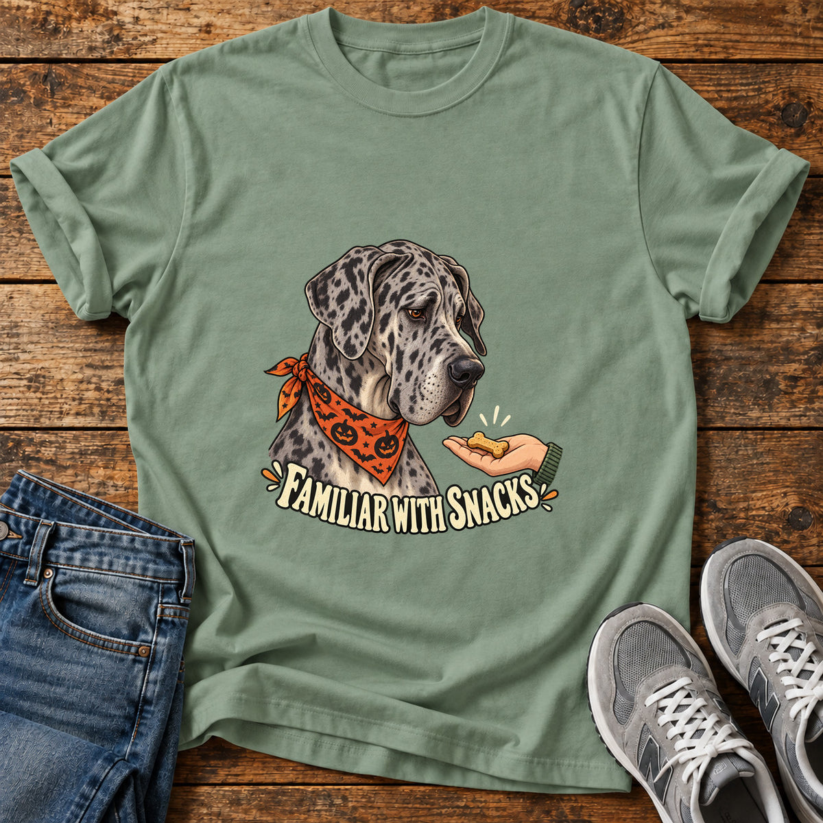 Familiar Snacks Great Dane graphic T-shirt in Sage, shown on a flat-lay shirt mockup