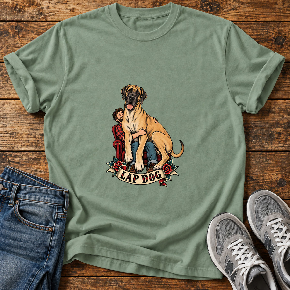 Lap Dog Great Dane graphic T-shirt in Sage, shown on a flat-lay shirt mockup