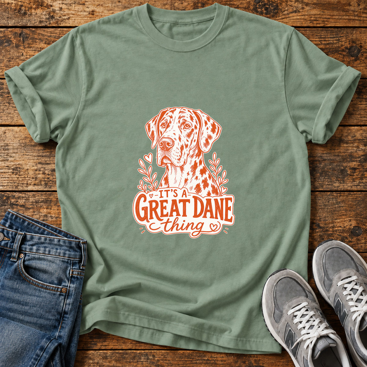 Great Dane Thing graphic T-shirt in Sage, shown on a flat-lay shirt mockup