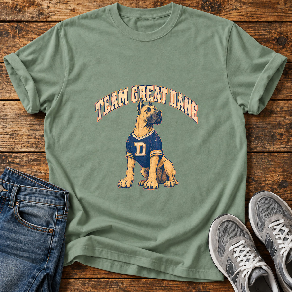 Team Great Dane graphic T-shirt in Sage, shown on a flat-lay shirt mockup