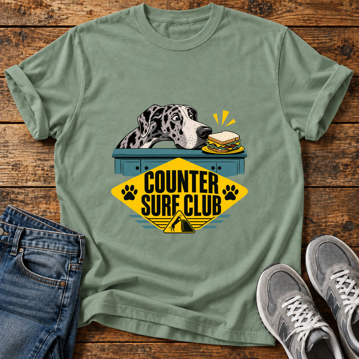 Counter Surf Club Great Dane graphic T-shirt in Sage, shown on a flat-lay shirt mockup