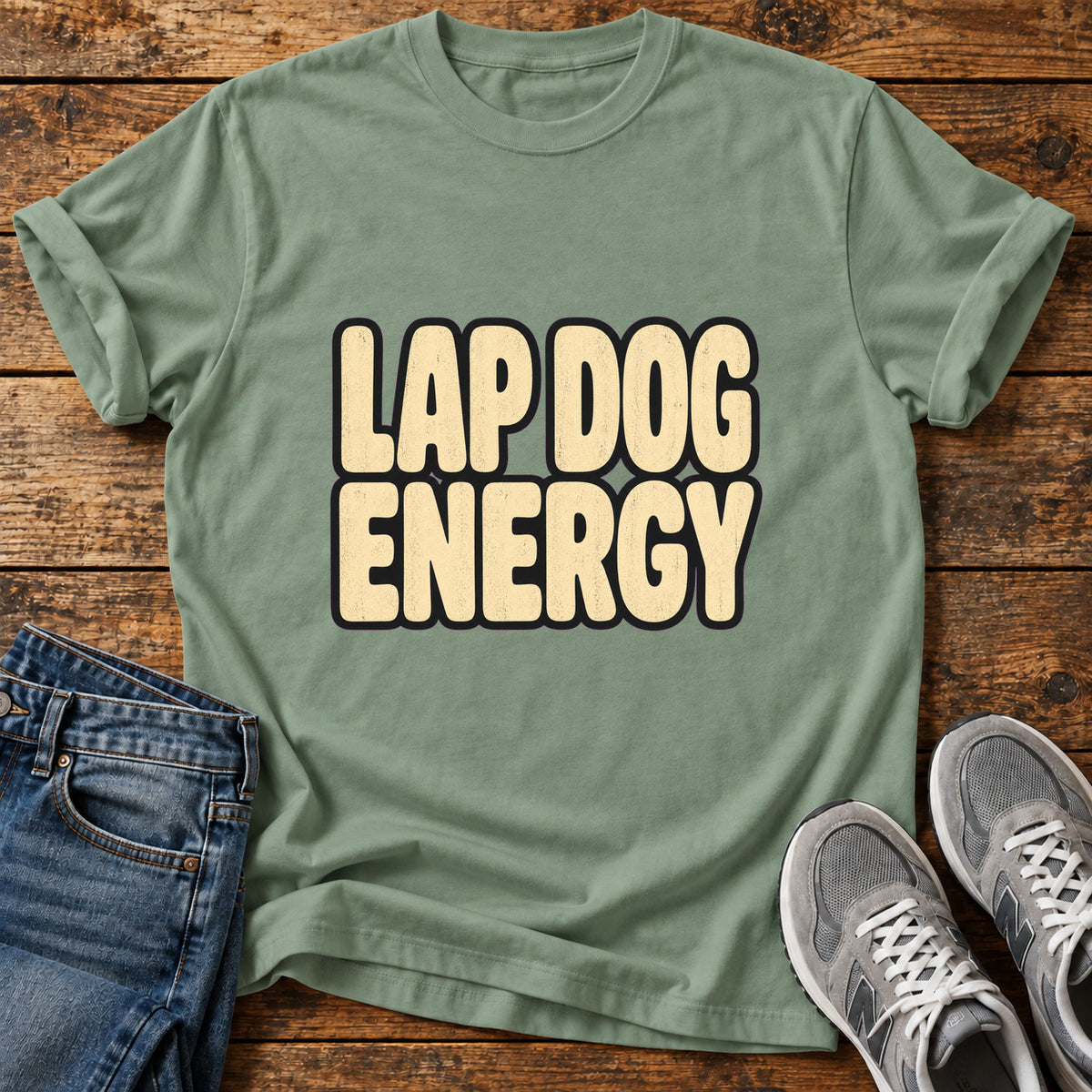 Lap Dog Energy Great Dane graphic T-shirt in Sage, shown on a flat-lay shirt mockup
