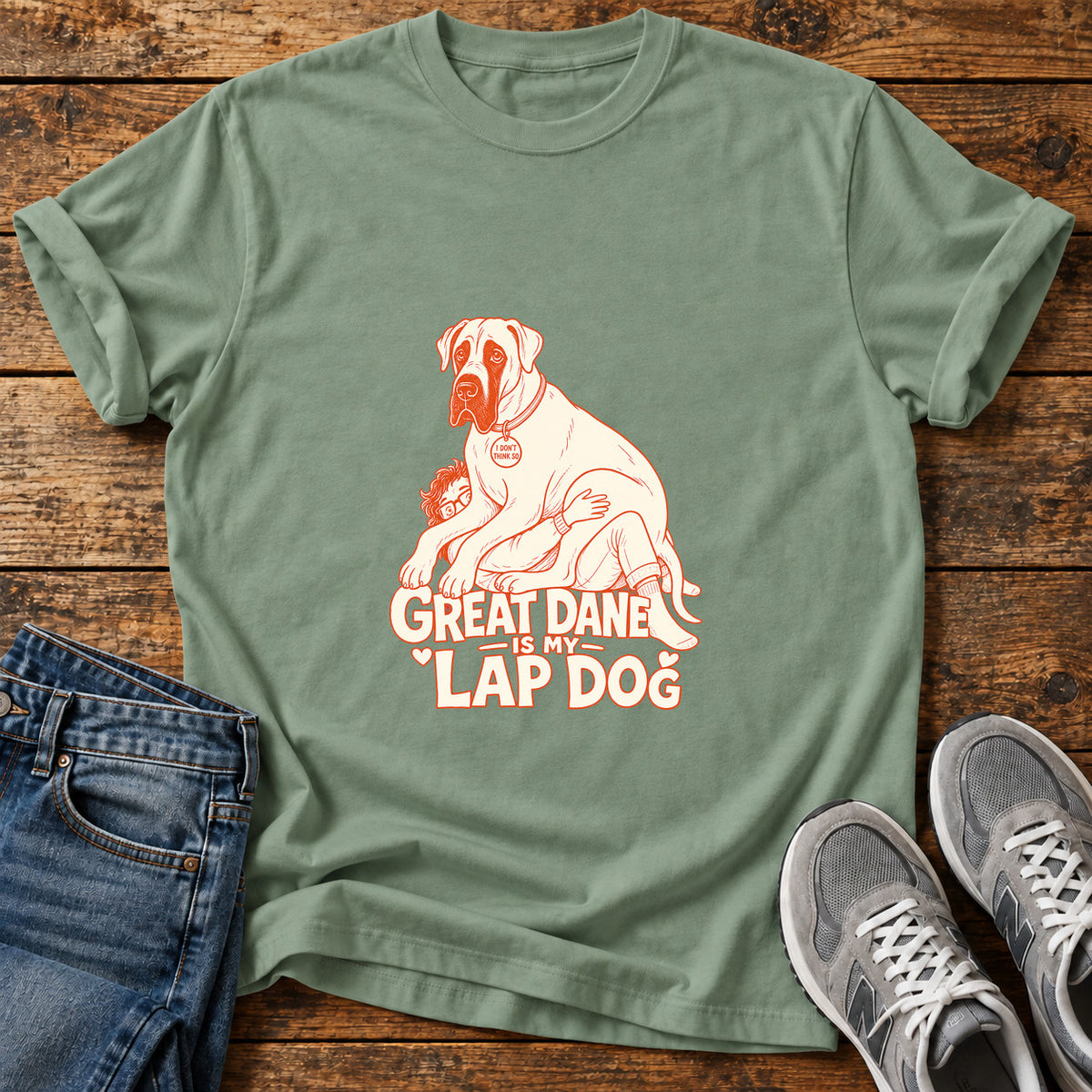 Great Dane Lapdog graphic T-shirt in Sage, shown on a flat-lay shirt mockup