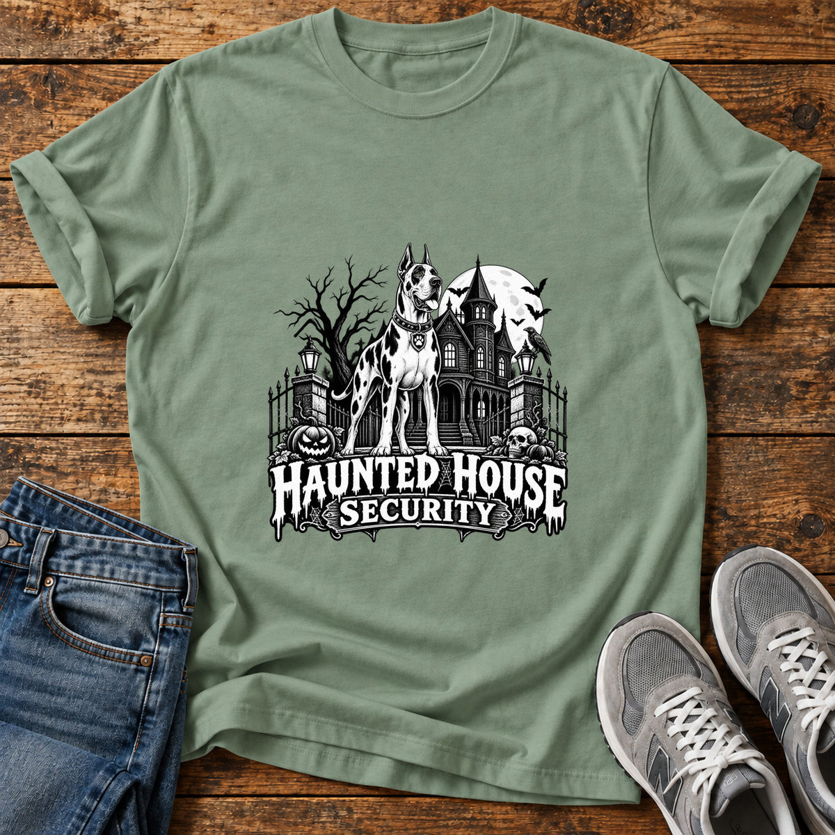 Haunted House Security Great Dane graphic T-shirt in Sage, shown on a flat-lay shirt mockup