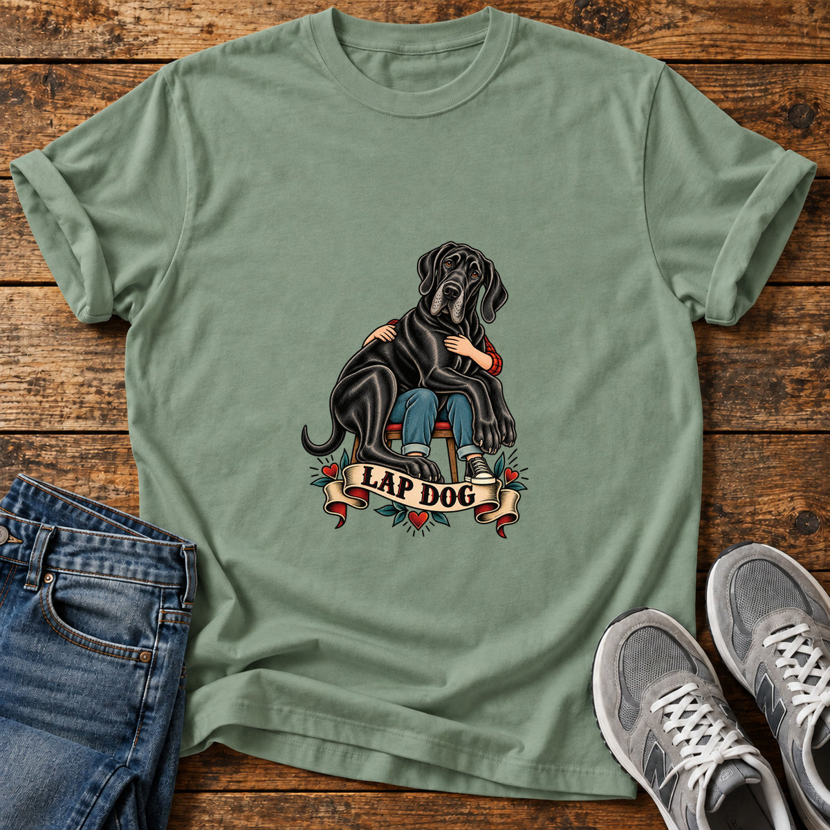Lap Dog Great Dane graphic T-shirt in Sage, shown on a flat-lay shirt mockup