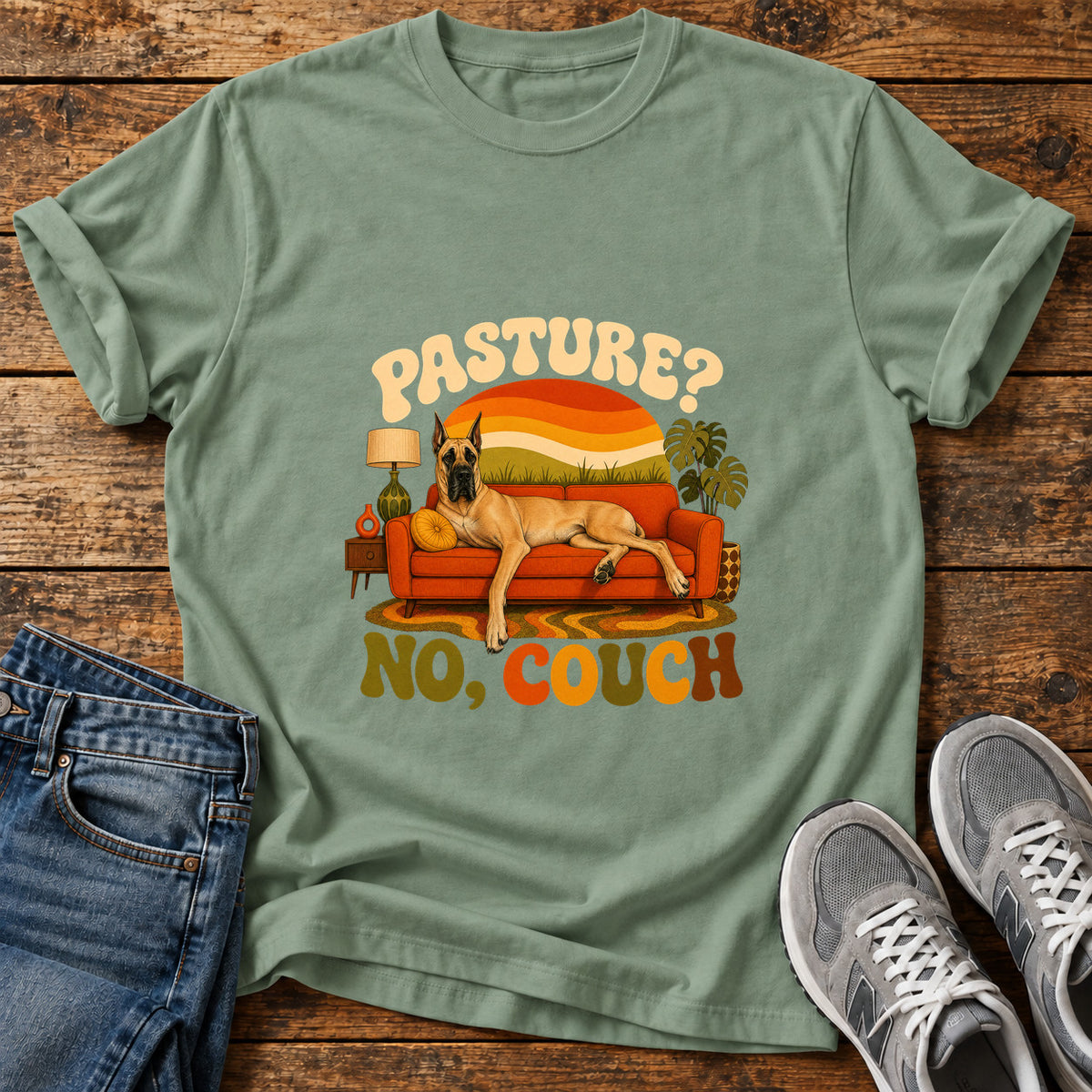 Pasture No Couch Great Dane graphic T-shirt in Sage, shown on a flat-lay shirt mockup