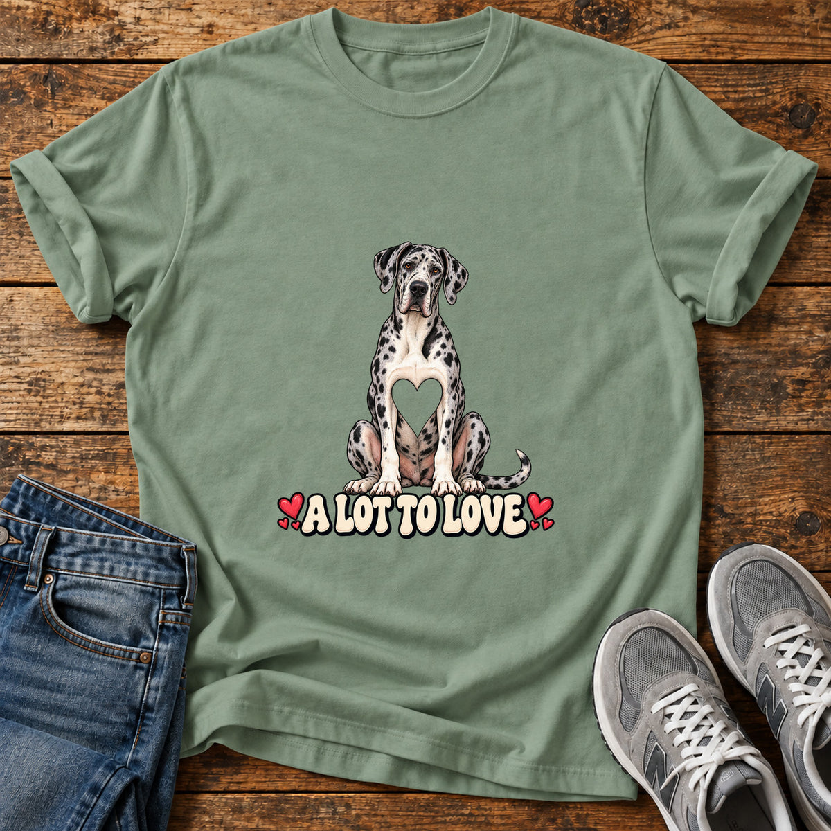 A Lot To Great Dane graphic T-shirt in Sage, shown on a flat-lay shirt mockup